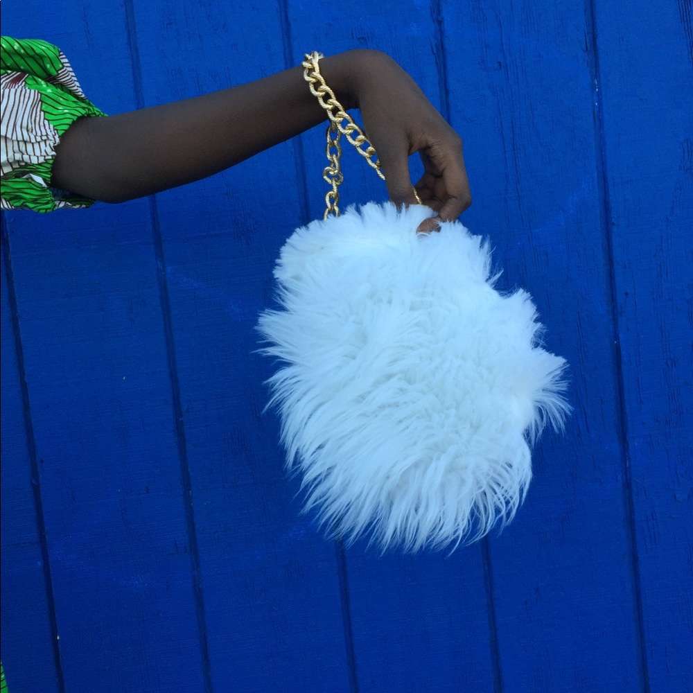 Mini round furr purse.